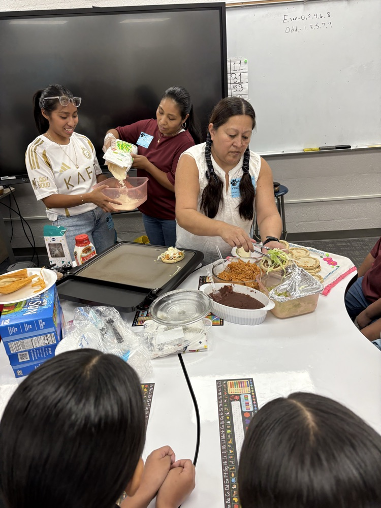 students making dish in classroom 