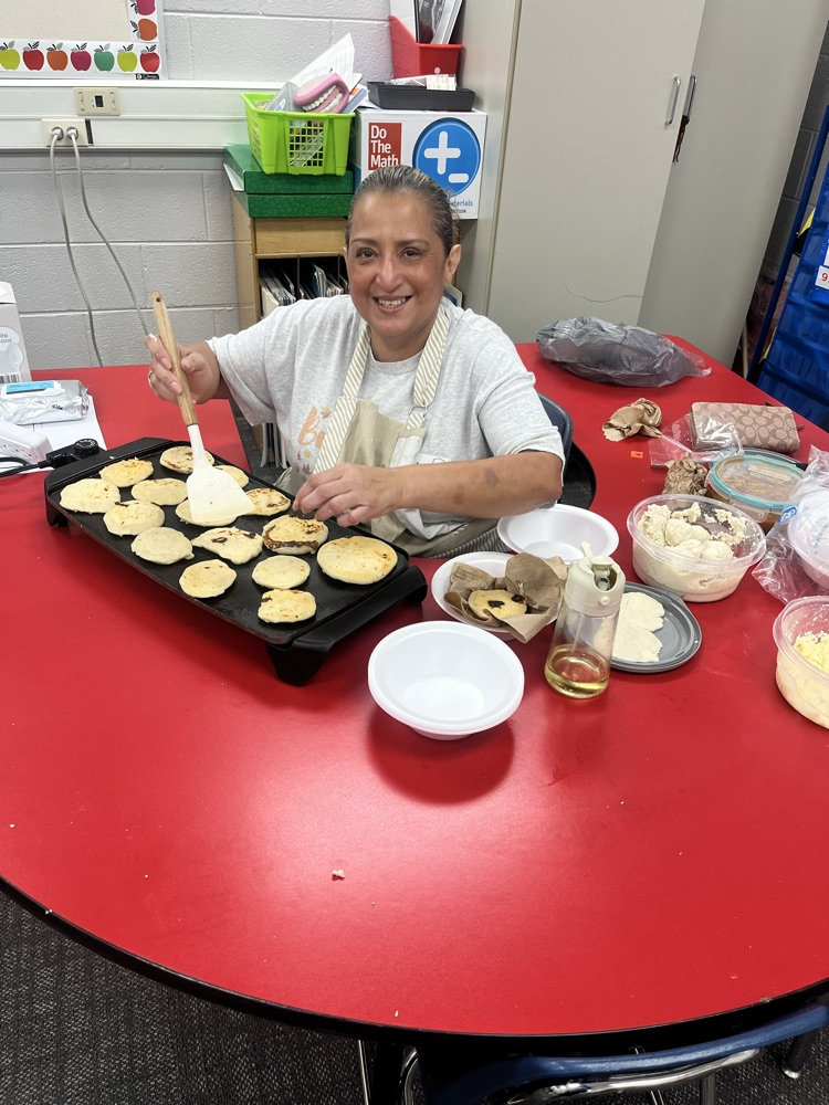 woman making pupusa 