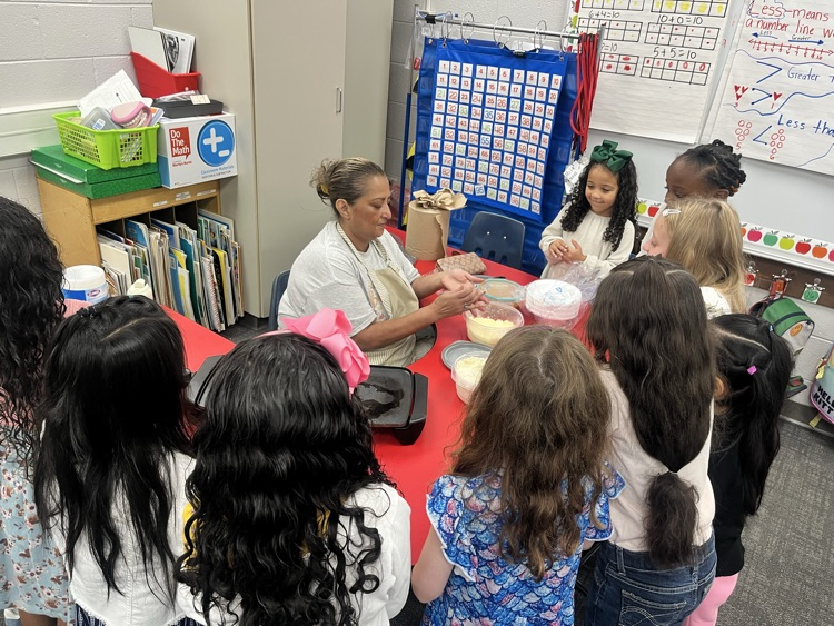 students in classroom at table 