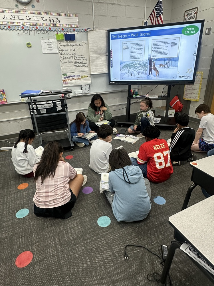 teacher working with small group
