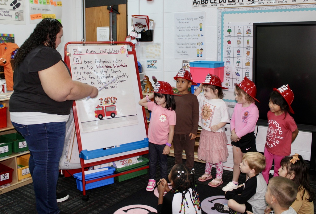  In Maribel Landeros’ class at Westwood School, students are learning about community helpers. They read and acted out the story “Five Brave Firefighters.” During the activity, students took on the roles of the firefighters and practiced their subtraction skills in a fun and engaging way.