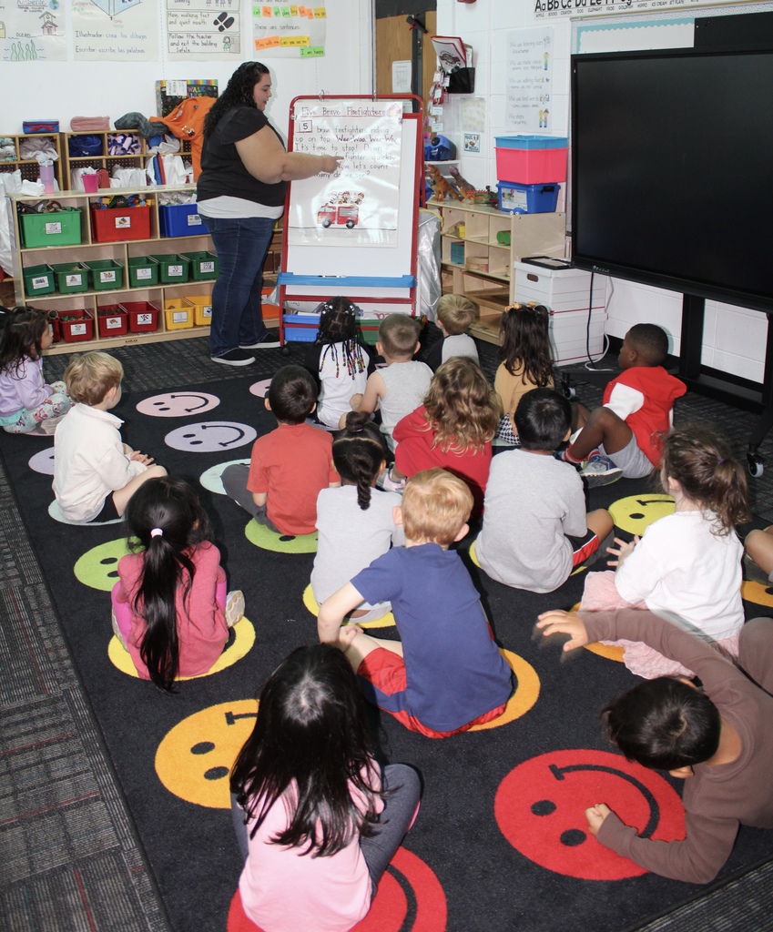  In Maribel Landeros’ class at Westwood School, students are learning about community helpers. They read and acted out the story “Five Brave Firefighters.” During the activity, students took on the roles of the firefighters and practiced their subtraction skills in a fun and engaging way.