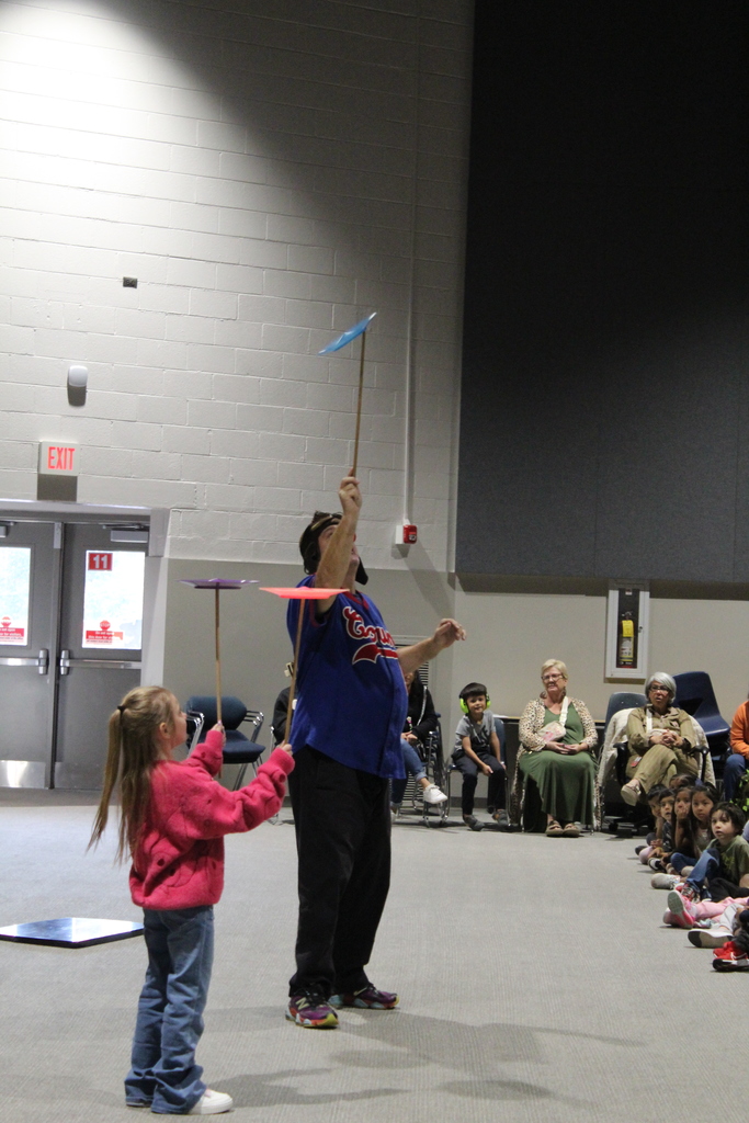 performer in school assembly 