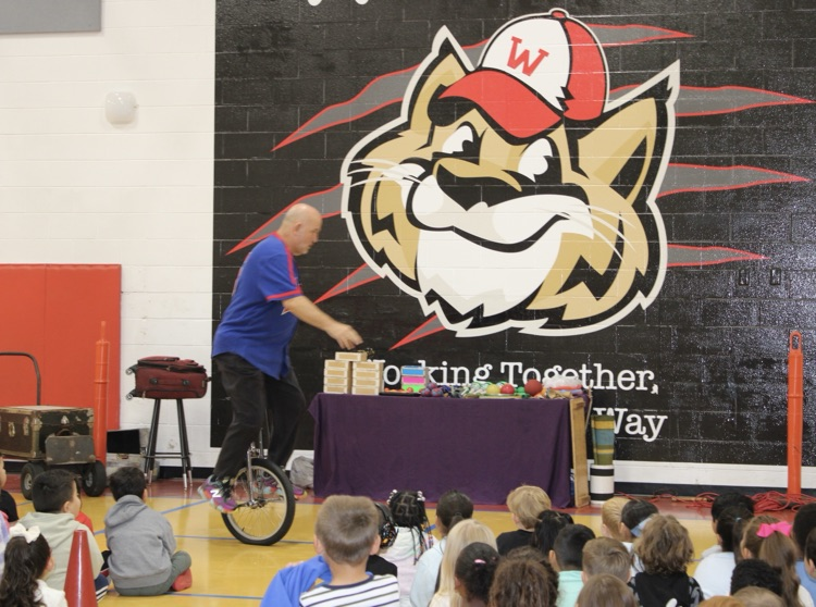 Presenter on a monocycle 