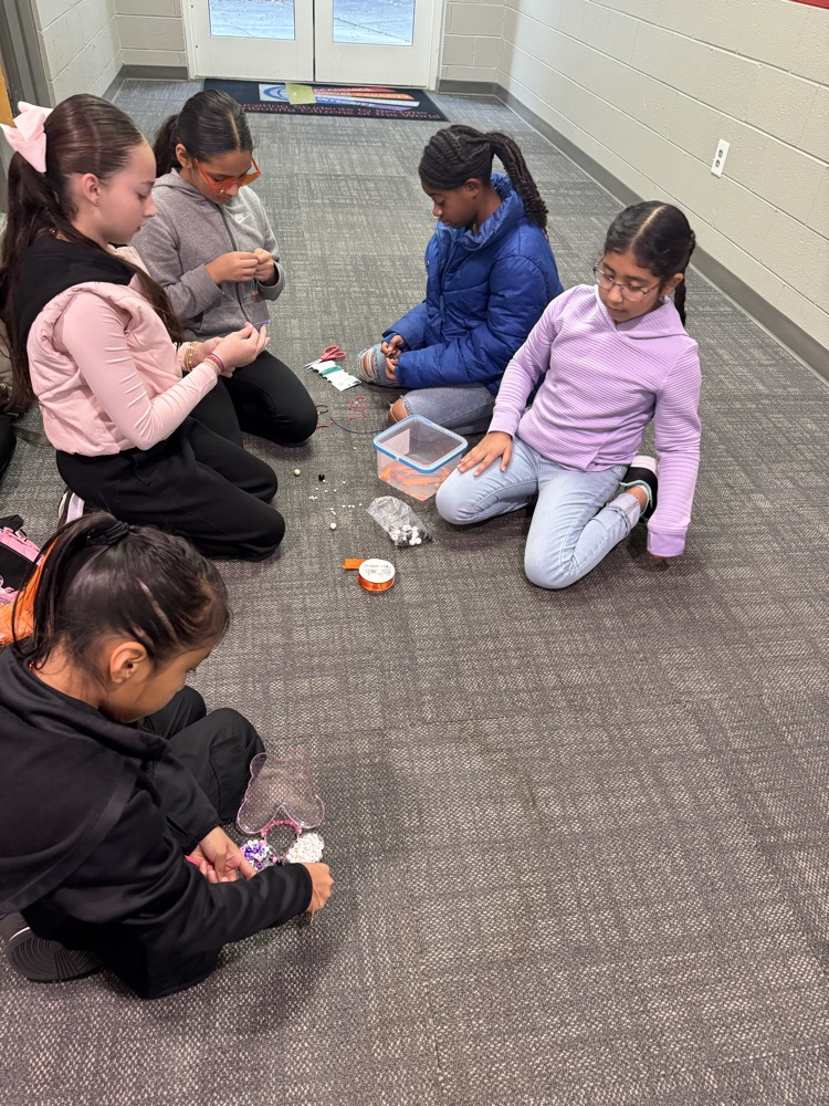 students working on bracelets