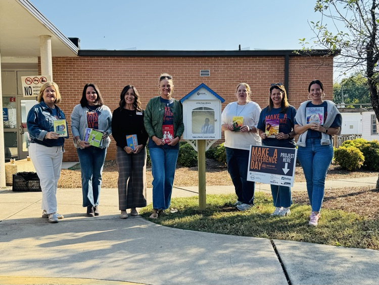 Picture of the United Way members with Ms. Dalton 
