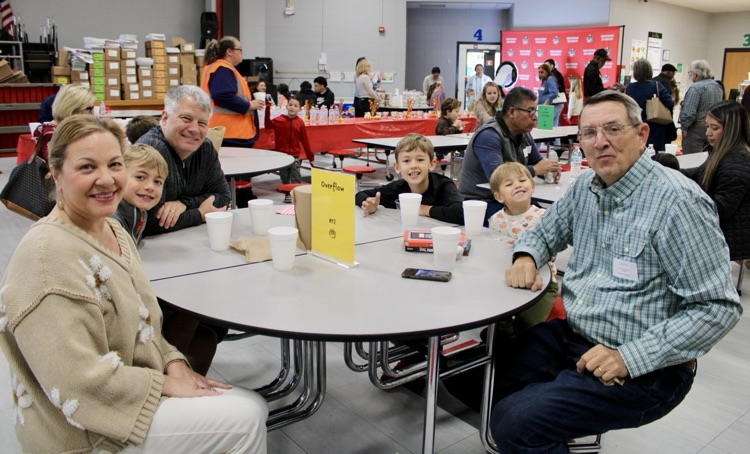 A group of grandparents with their kids