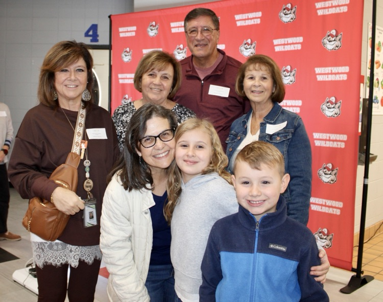 A family with their students.