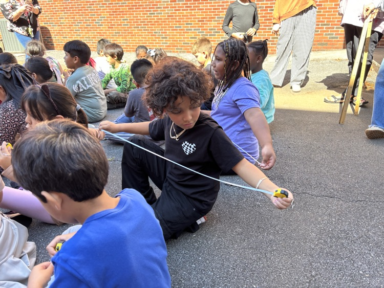 students measuring 