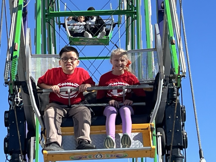 Students riding the Ferris Wheel