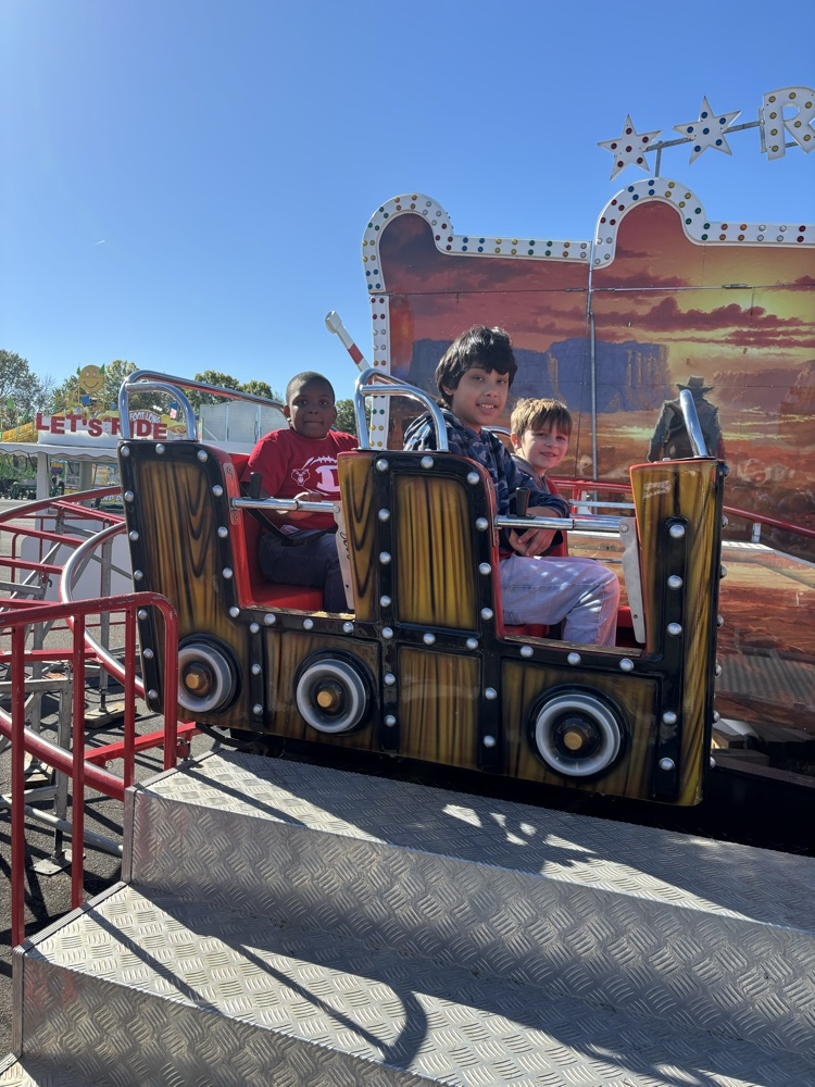 Student having fun on a ride 