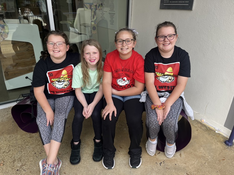 A group of students wearing Westie shirts