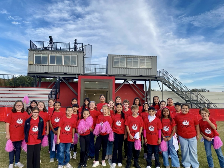 Westwood Chorus students on the soccer field 