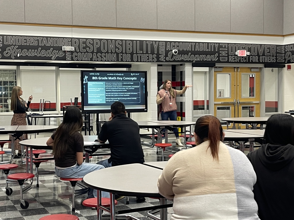 Teacher presenting to parents