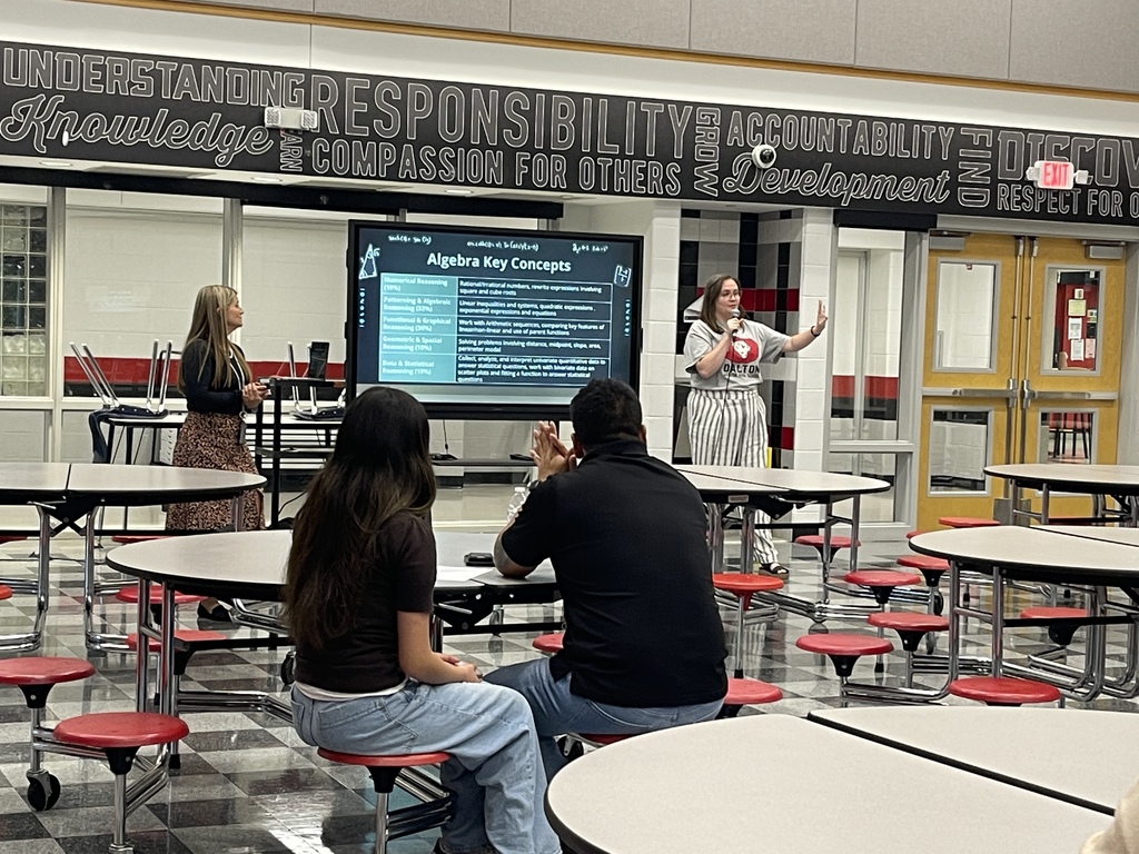 Teacher presenting to parents