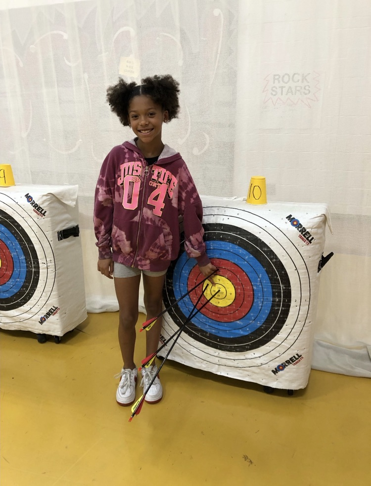 A students hitting a bullseye 