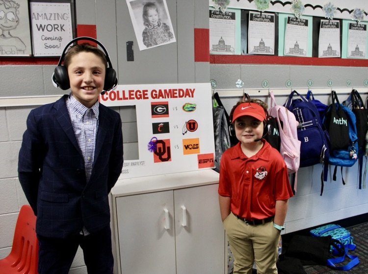 Students dress up a sports commentator and Georgia football coach 