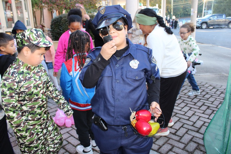 Student dressing up as a police for Career Day