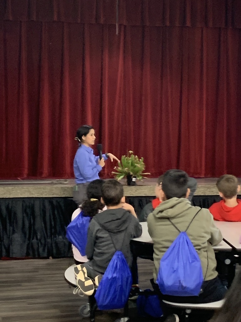 Ecologist Iris Avila leading our students through a soil study at Lakeshore Park