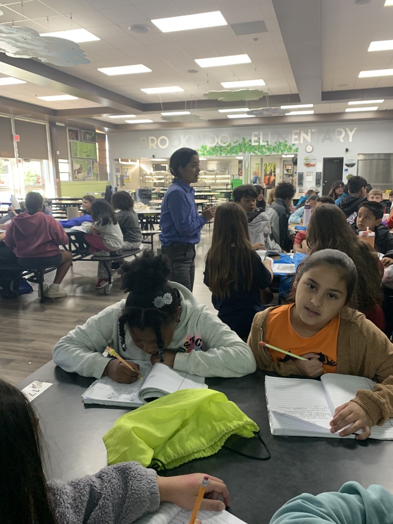 Ecologist Iris Avila leading our students through a soil study at Lakeshore Park