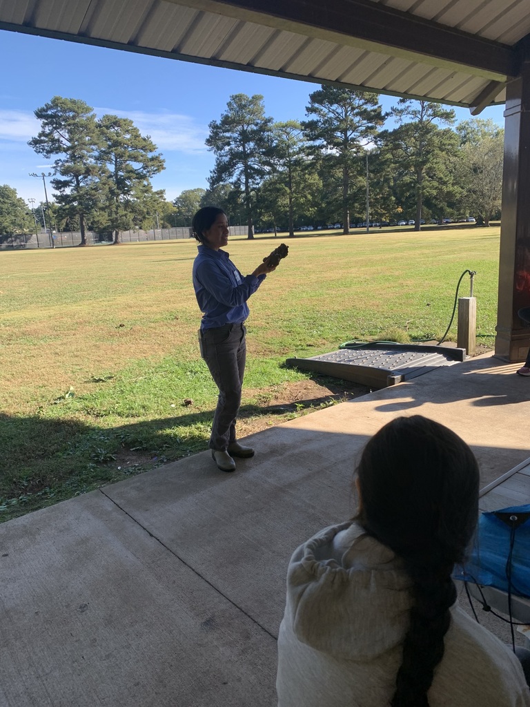 Ecologist Iris Avila leading our students through a soil study at Lakeshore Park