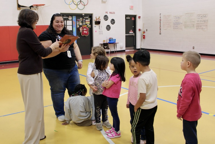 Carmen Deedy signing a book 