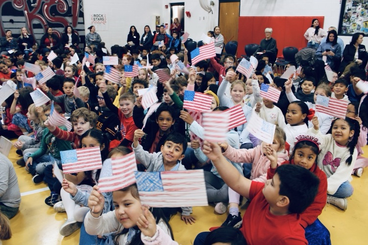 Students waving flags 
