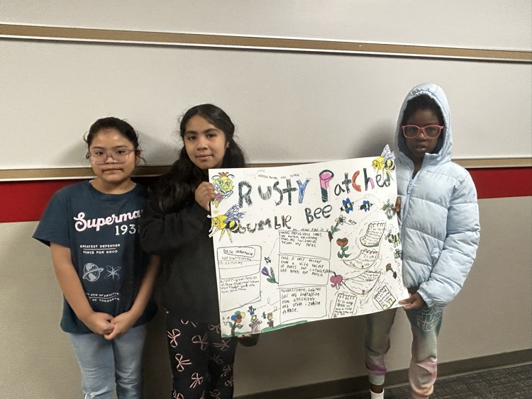 students with posters 