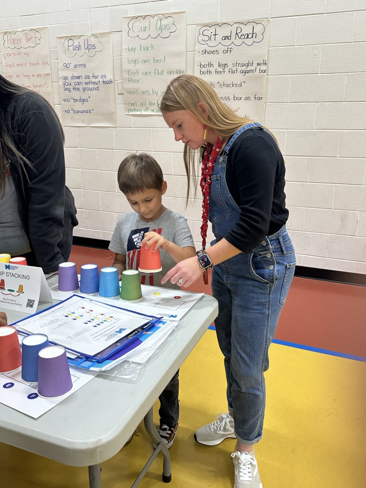 A student and a teacher playing a math game