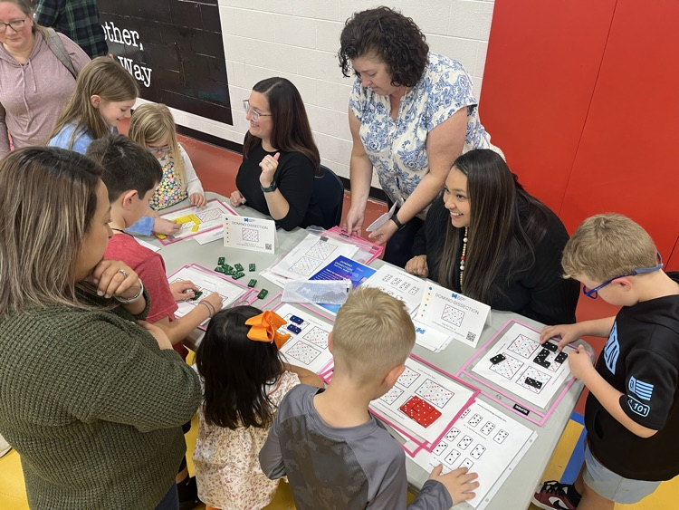 Teachers, students and parents playing a math game