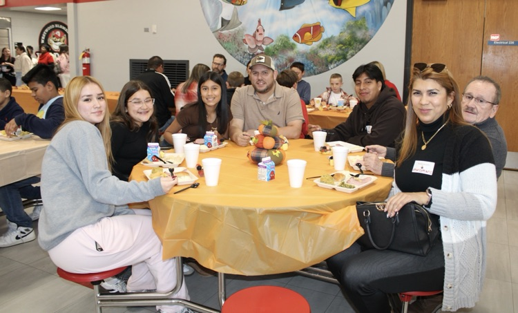 Students with family and friends