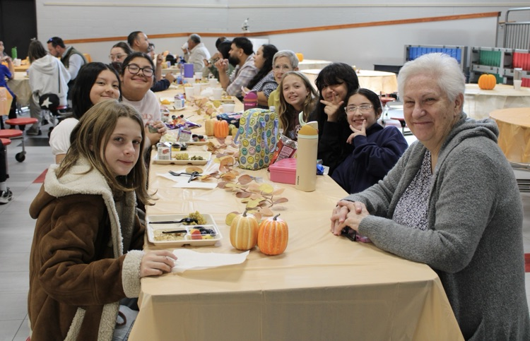 Students with family and friends