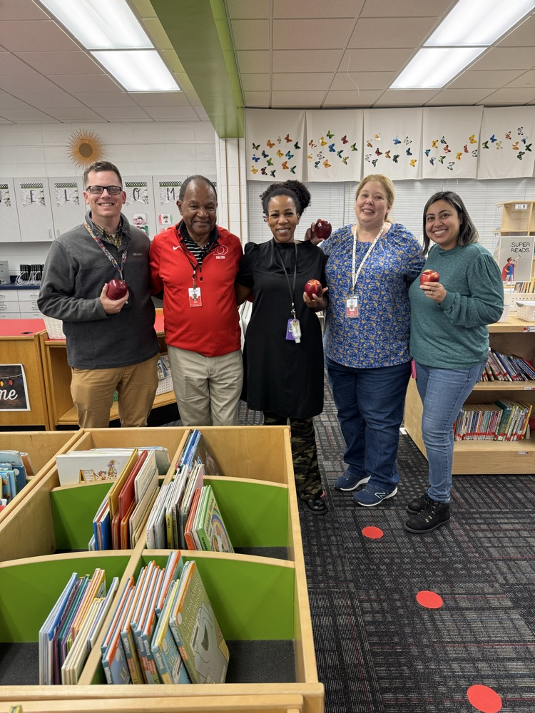 A group of teachers with Mr. Tulley.