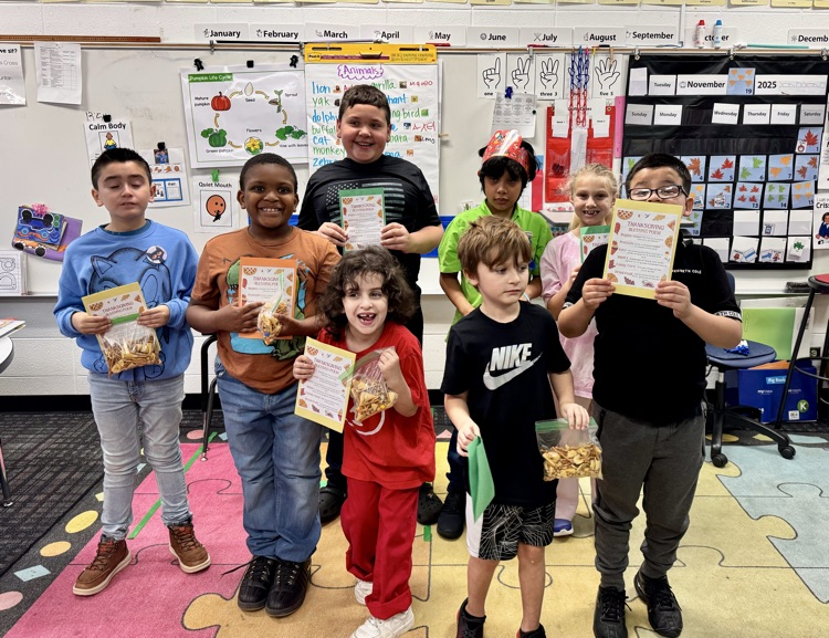 A group of student holding their Blessing Poem Trail Mix