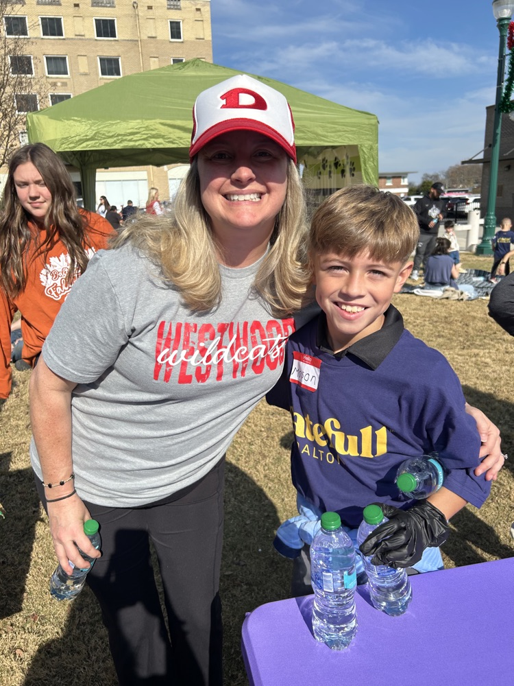 A Westwood teacher and student helping at the event 