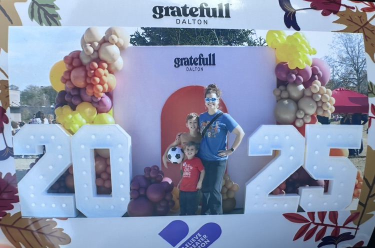 A Westwood teacher and her kids taking a picture at the event 