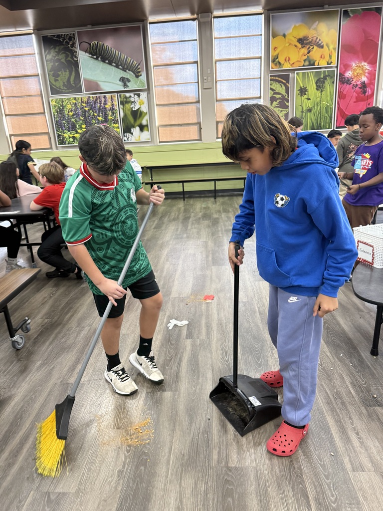 students cleaning up after bean soup packing