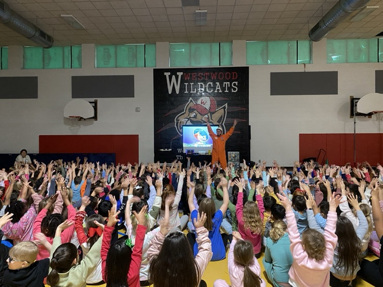Students interacting with the presenter of Jonas Program