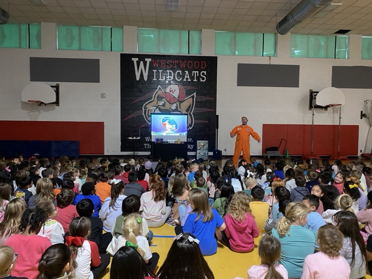 Students listening to the Jonas Program presenter 