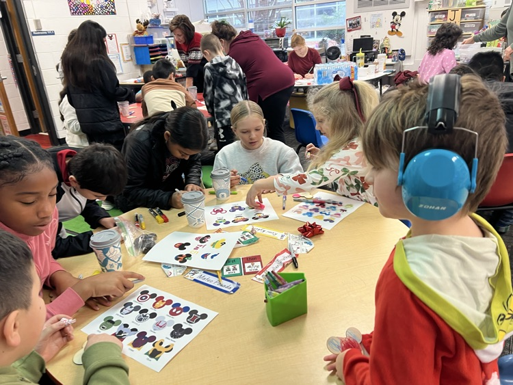 Students making ornaments with their buddies