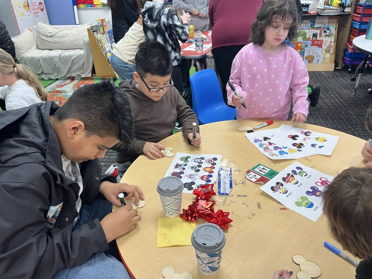 Students making ornaments with their buddies