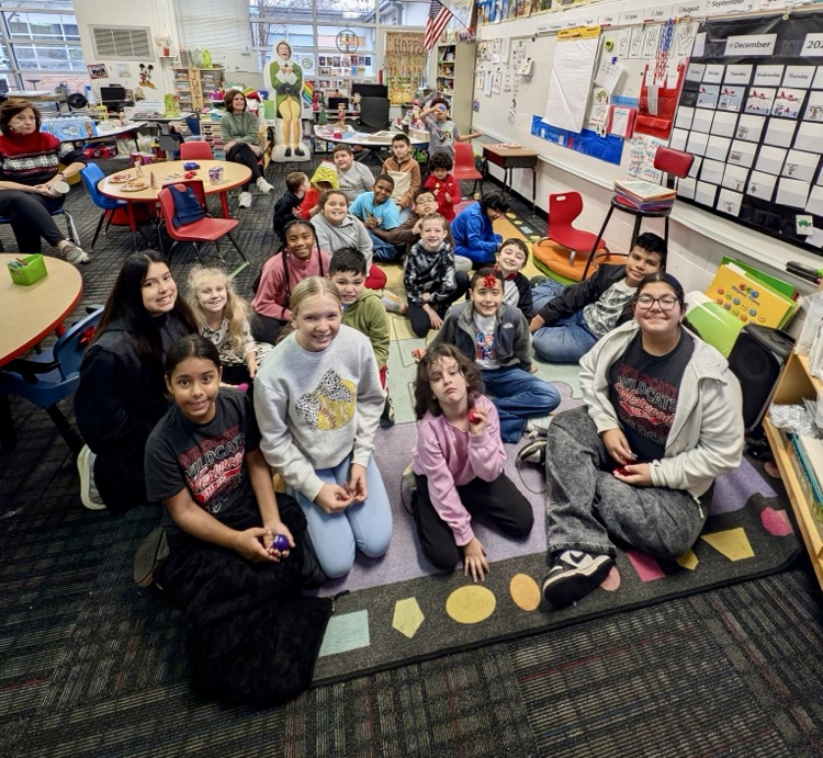 A group picture of the students and reading buddies