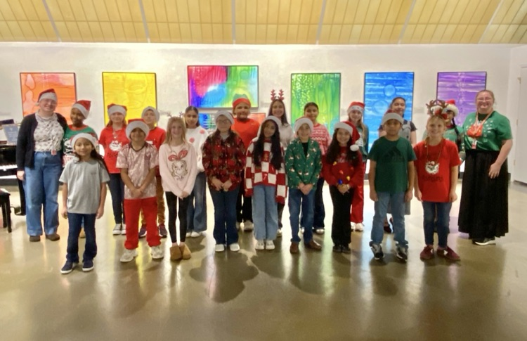 A picture of the students with music teacher