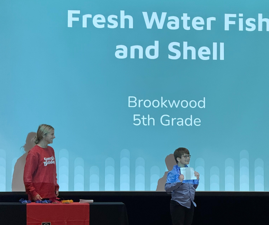 student giving 4H speech about fresh water fish and shell