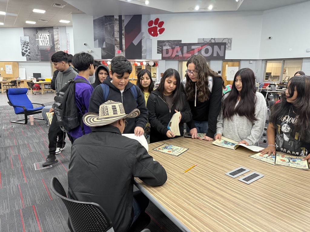 Luis Soriano signing a book