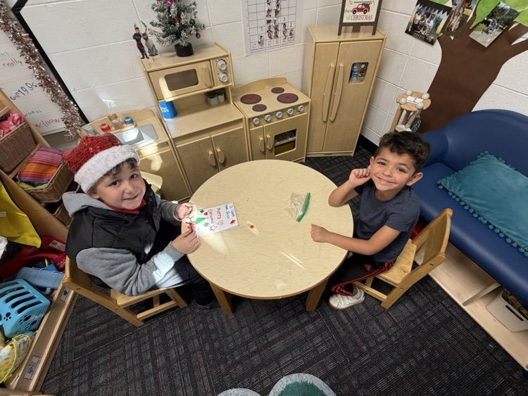 A PreK student with his buddy
