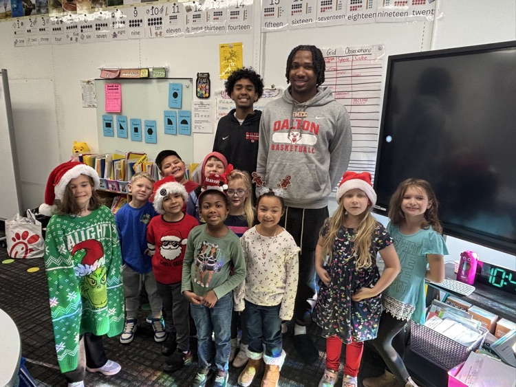 Mrs. Elrod’s class with two basketball players