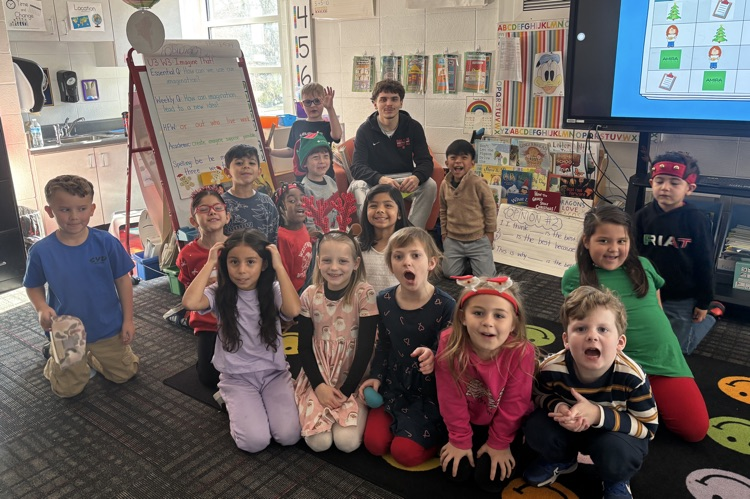 Basketball players with a 1st grade class