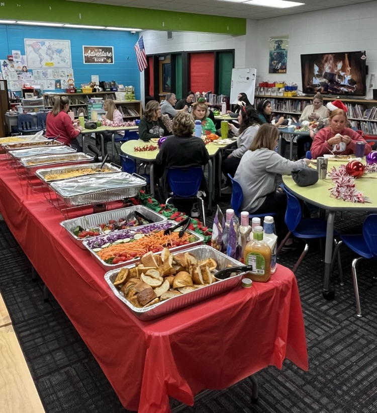 Teacher eating at the Media Center