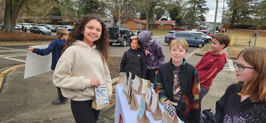 2nd grade students making and selling dog treats